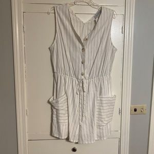 Cute, navy, pin-striped romper!  Tags still on.